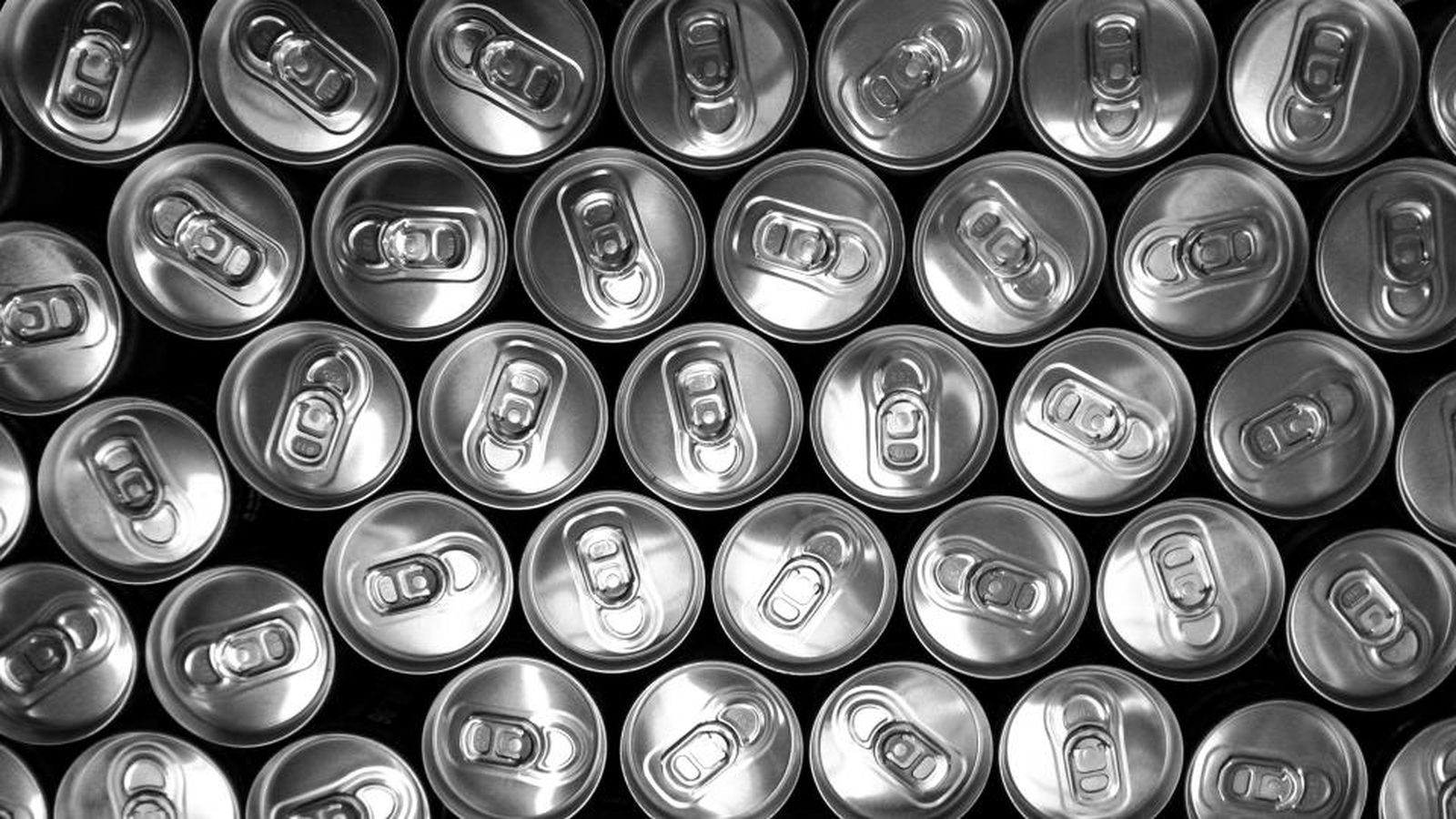 Rows of aluminium beverage cans seen from above